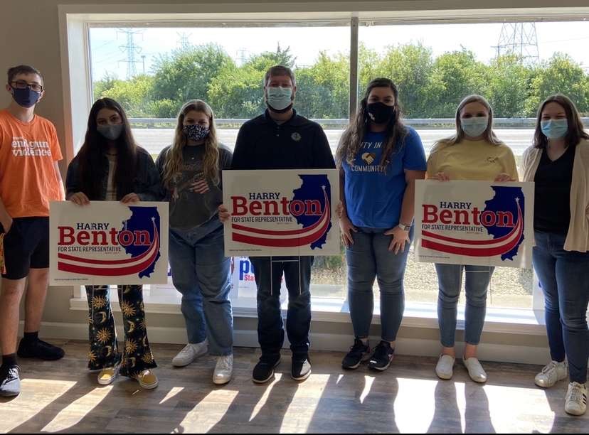 Members of Plainfield High School Democrats pose with 97th district state representative  candidate Harry Benton (middle)