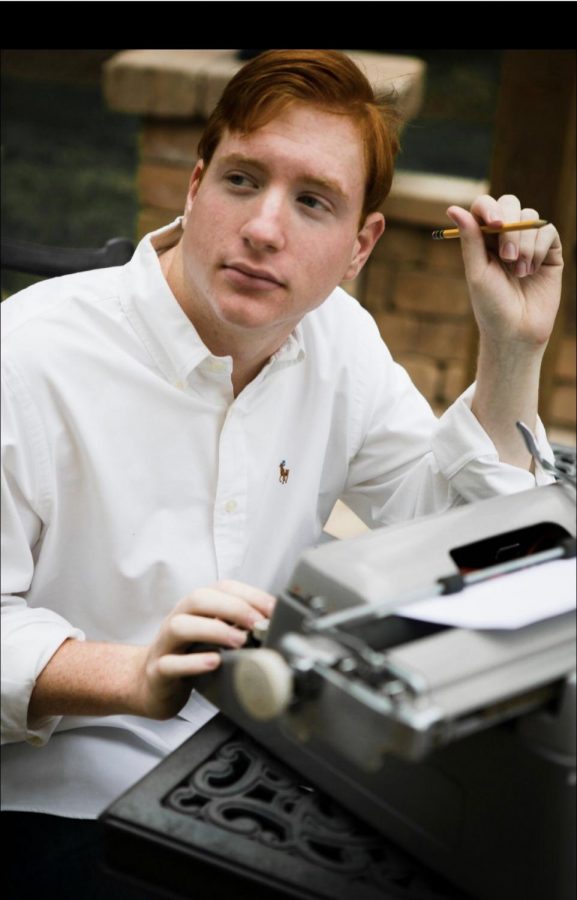 Senior Nick Pallotto looks off into the distance as he is thinking about his next story idea.