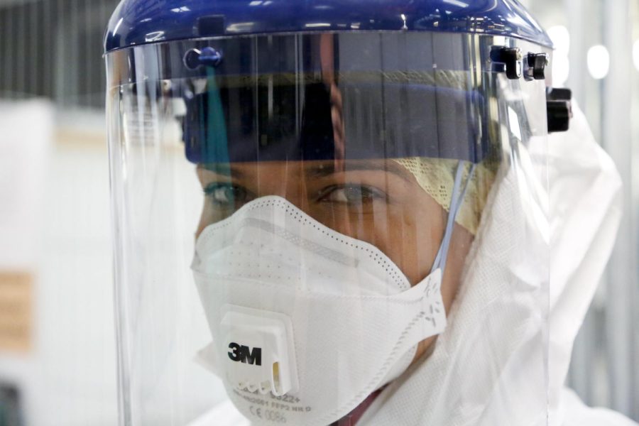 New face of nursing: personal protective equipment donned by medical personnel is the new uniform in the fight against covid. photo by pixabay