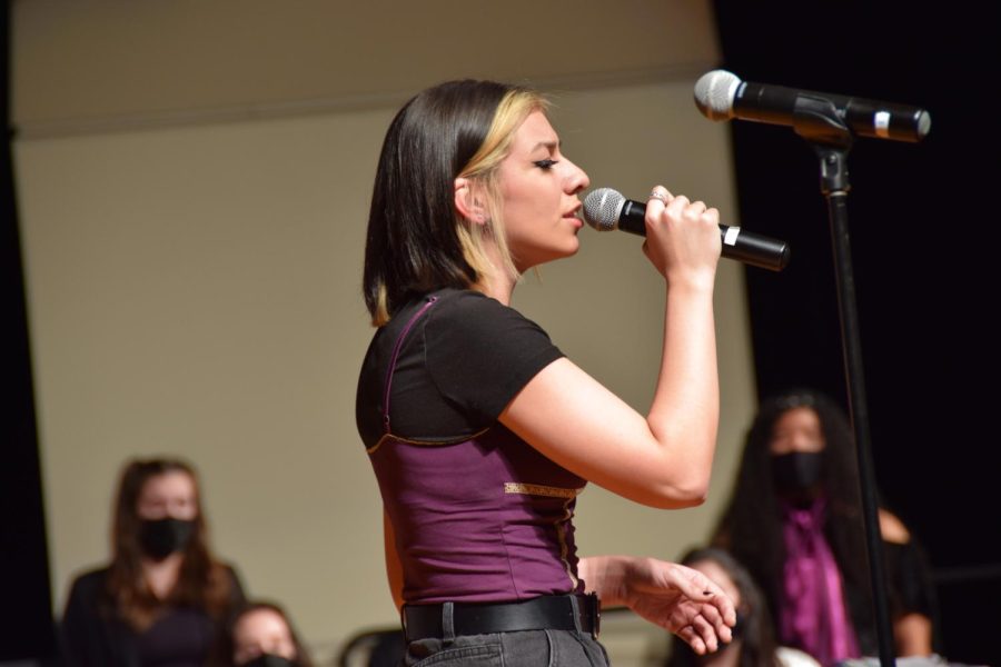 Junior Angel Vera performs a solo at Norths choir concert. Photo by Paige Collins