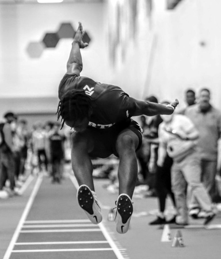 Sophmore Kwame Amoo-Otoo attempting the triple jump at the Lakes High Invite. Photo courtesy or Tony Holler