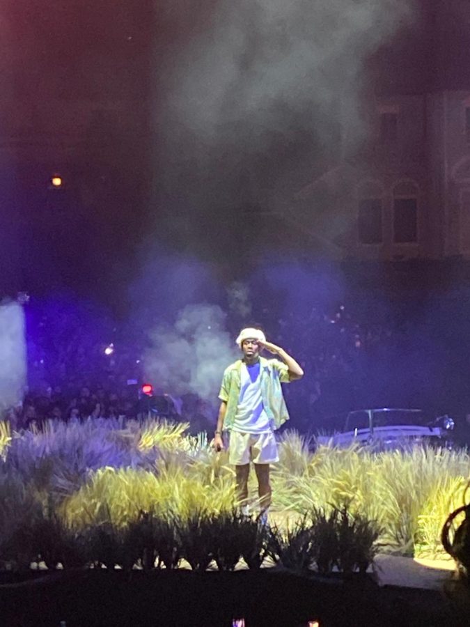 Tyler, the Creator salutes the audience as he performs at the United Center on Feb. 22. Photo by Julia Gerard