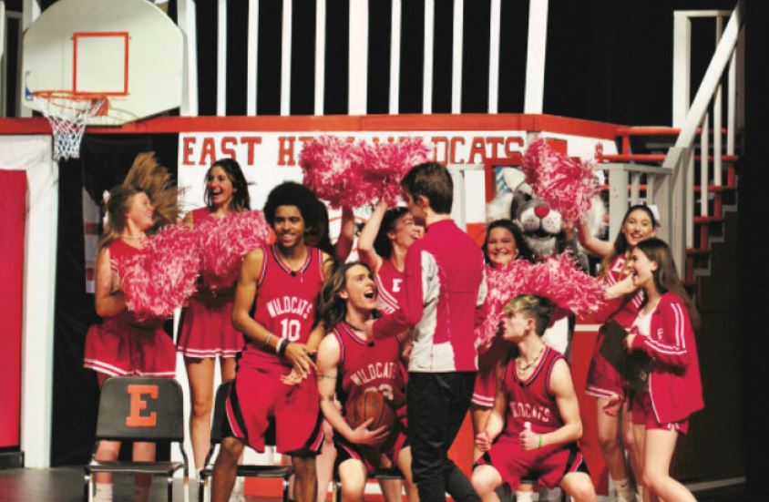 Coach Bolton played by senior Ethan Lenning gives a pep talk to the East High Wildcats during the championship game in Norths Spring production of High School Musical. Photo by Nick Powell