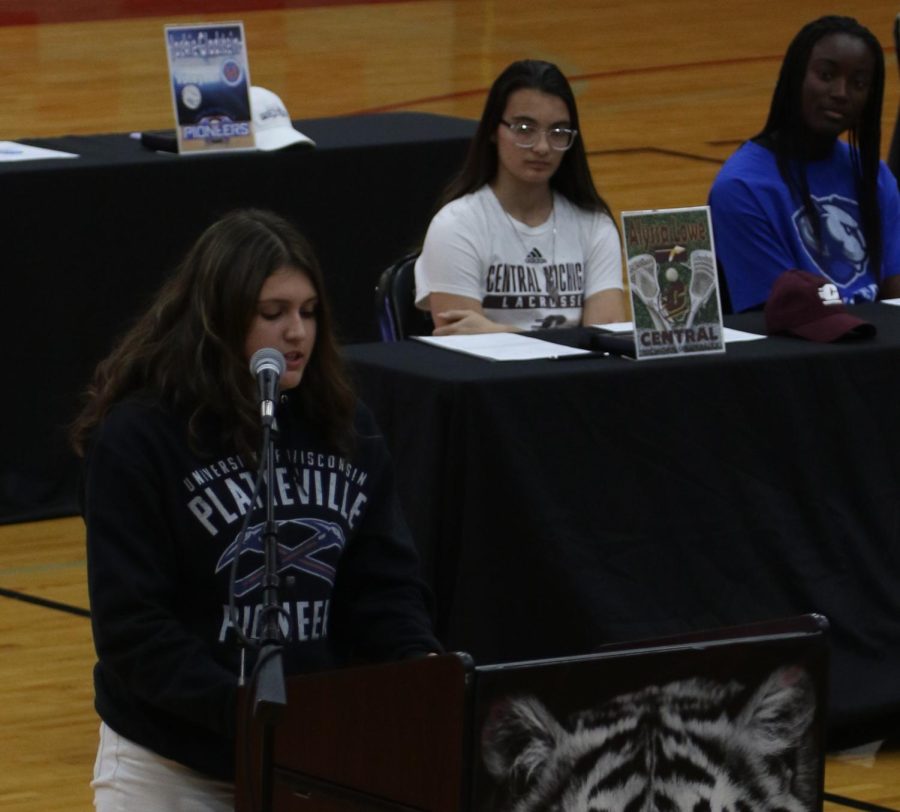 Fall athletes committed to their prospective colleges during Signing Day on Nov. 9
