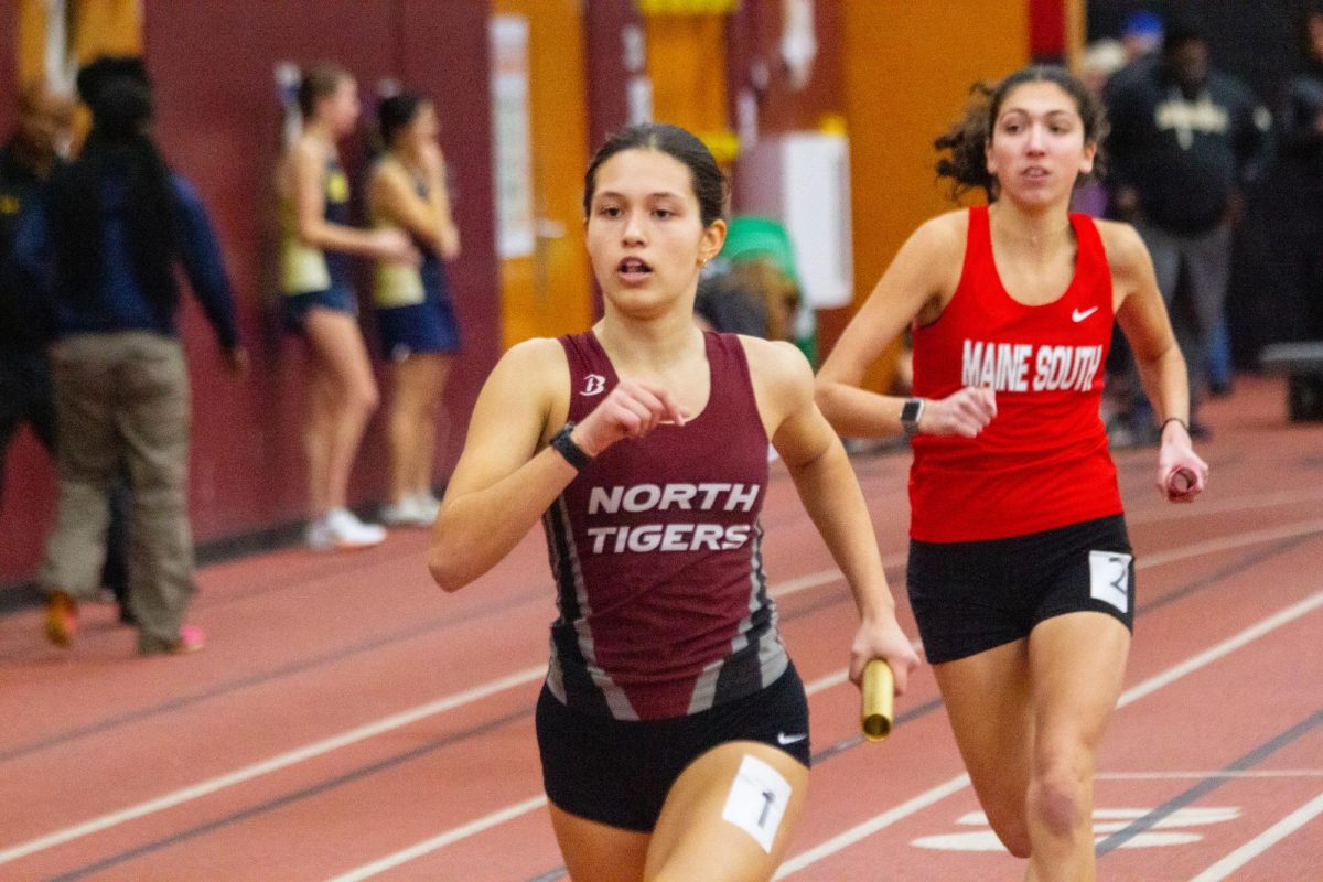 Junior Elsie Czarniewski competes in the 4x400m even at Norths indoor invite on Feb. 23.